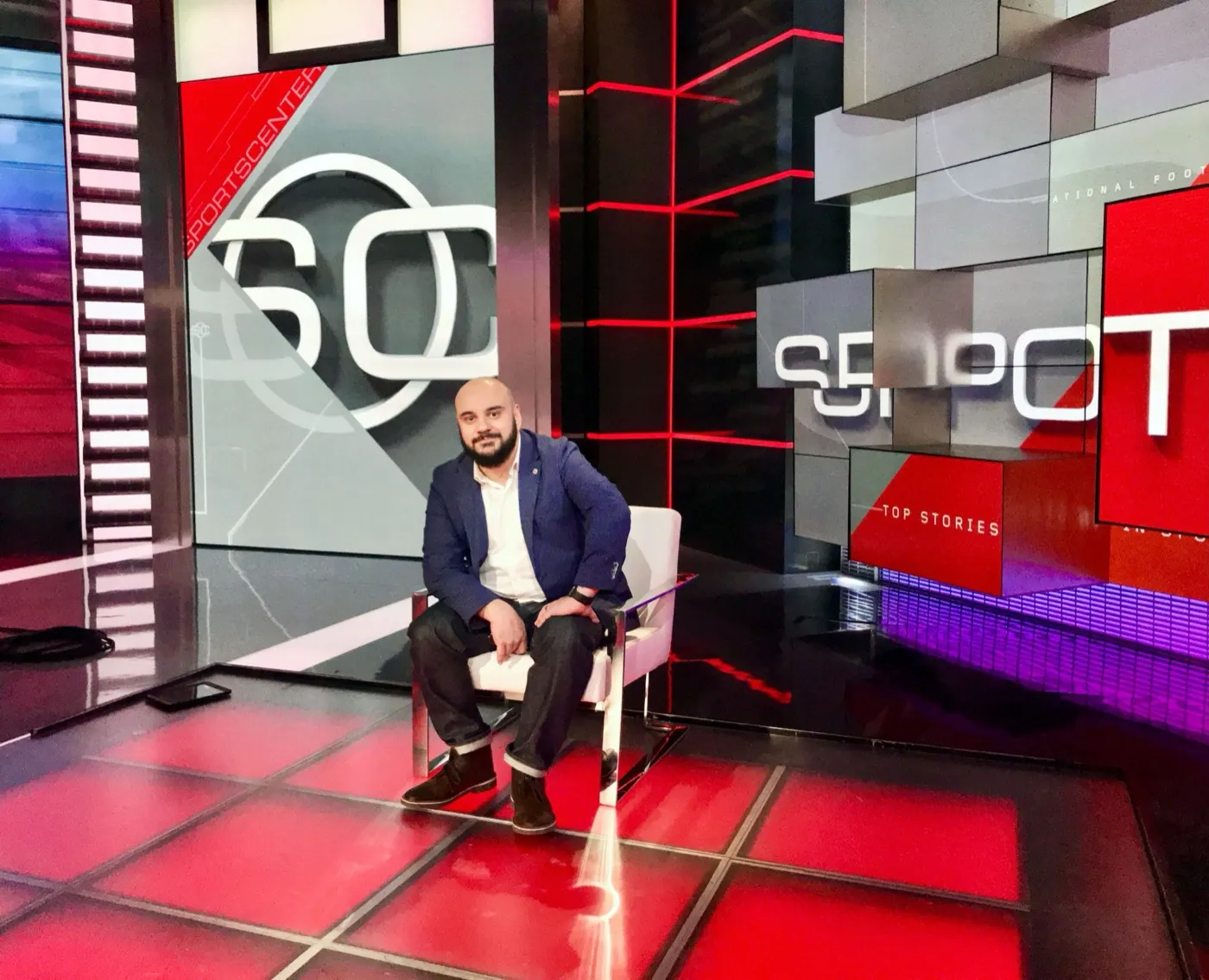 John LaCroix seated on the SportsCenter set at ESPN